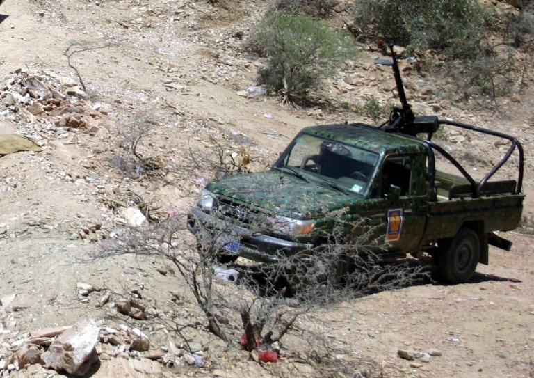 A Yemen Police Toyota Land Cruiser HZJ79 technical armed w/DShKM.