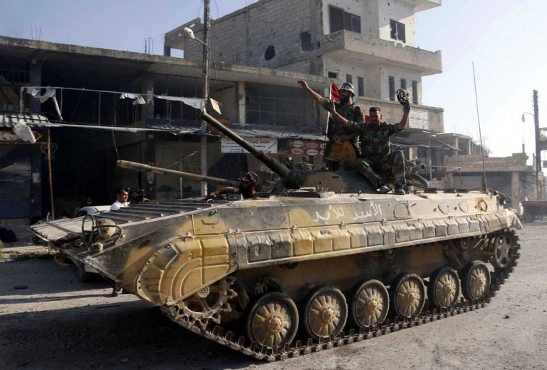 A Syrian Army BMP-1 in the city of Quseir, June 6, 2013